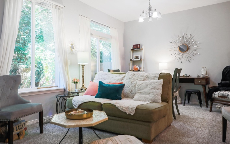 Living room with Dining and Patio access